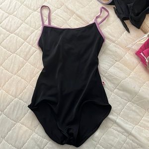 yumiko kiki style leotard with lilac trim and black base color super flattering
